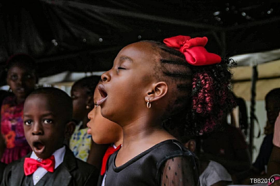 Teacher helping student